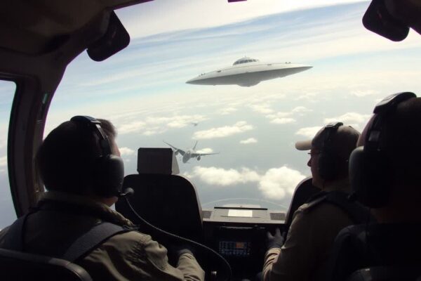 a group of people in a cockpit looking out a plane